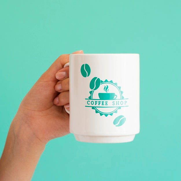 Woman Holding Up A White Coffee Mug Psd