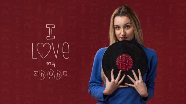 Woman Holding Vinyl On Burgundy Background Psd