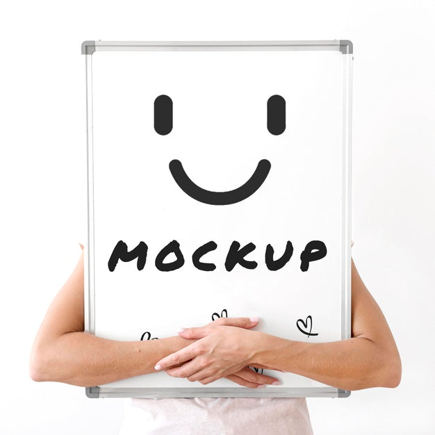 Woman Holding Whiteboard In Her Arms Psd