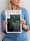 Woman Holding With Both Hands A Nature Magazine Psd