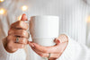 Woman In A White Sweater With A White Cup Mockup Psd