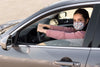 Woman In Car Wearing Medical Mask Psd