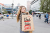 Woman In City With Black Friday Bags Psd