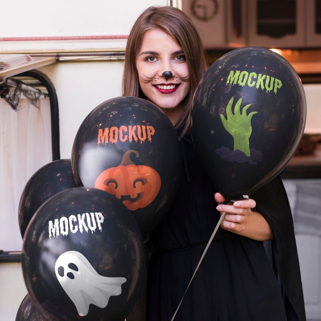 Woman In Halloween Costume Holding Mock-Up Balloons Psd