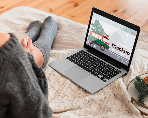 Woman Looking At A Laptop With Mock-Up Screen Psd