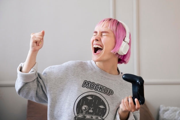 Woman Playing Video Games At Home With Controller And Headphones Psd