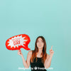 Woman Pointing Up With Speech Balloon Mockup Psd