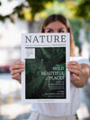 Woman Showing A Nature Magazine Mock Up Psd