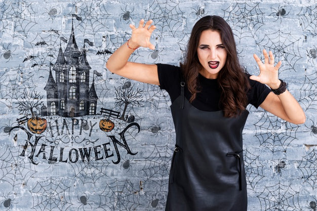 Woman Showing A Scary Gesture For Halloween Psd