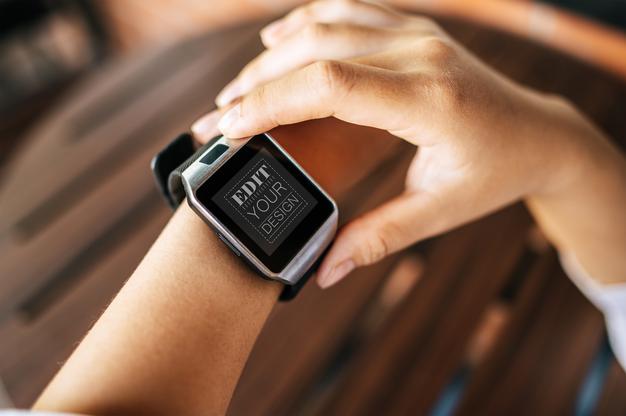 Woman Using Smart Watch Psd Mockup Psd