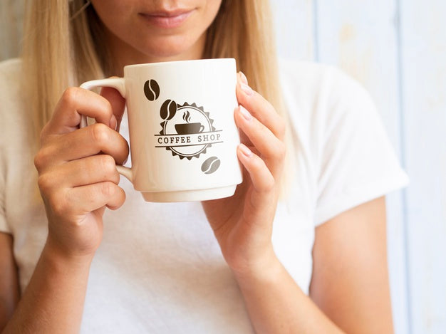Woman Wanting To Drink From A Coffee Mug Psd