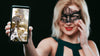 Woman With Carnival Mask Showing Smartphone Mockup Psd