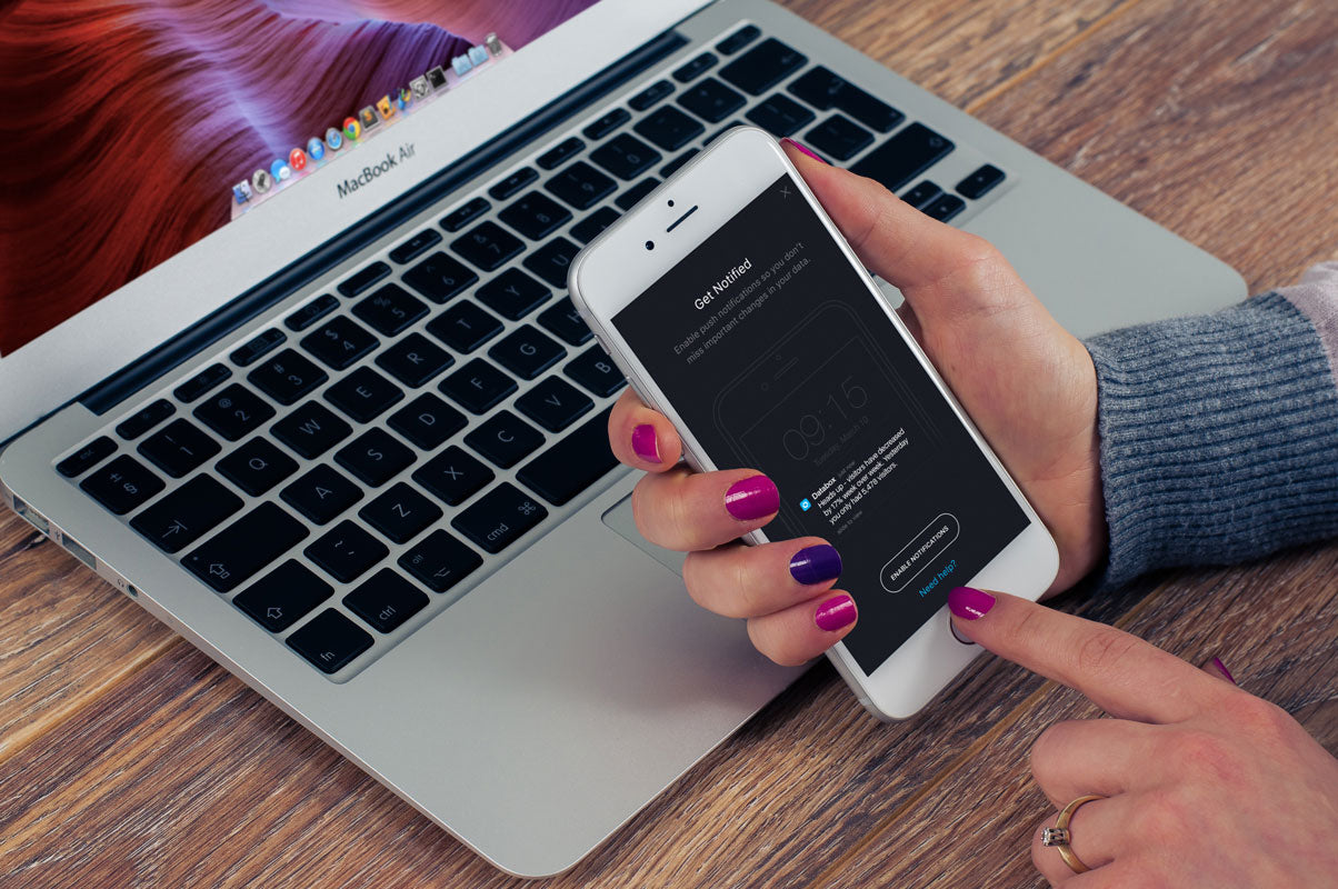 Woman with iPhone 8 Mockup in Her Hand