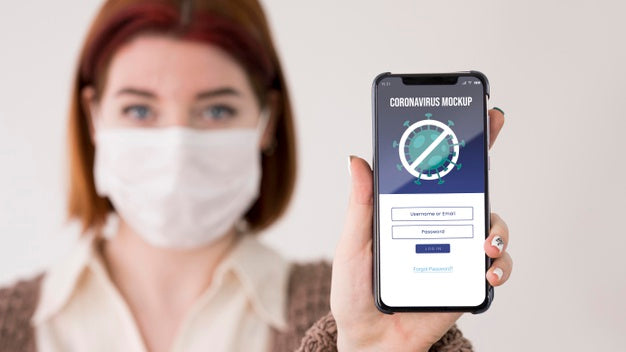 Woman With Masks Holding Smartphone Psd