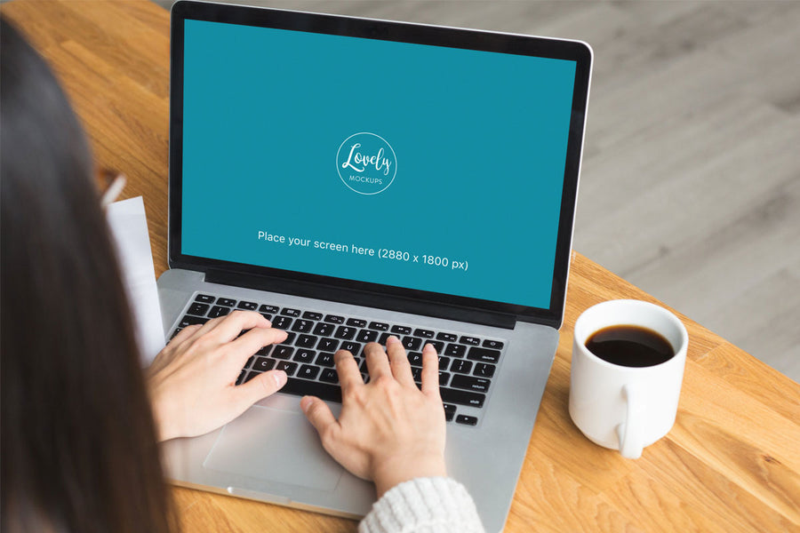 Woman Working on a Macbook Pro Mockup
