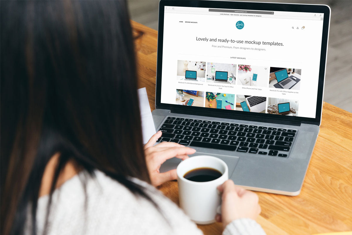 Woman Working on a 15 Inch Macbook Pro
