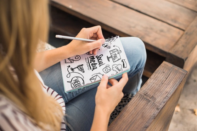 Woman Writing On Notepad Mockup Psd