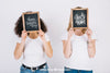 Women Holding Slate In Front Of Face Psd