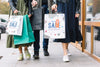 Women With Shopping Bags In City Psd