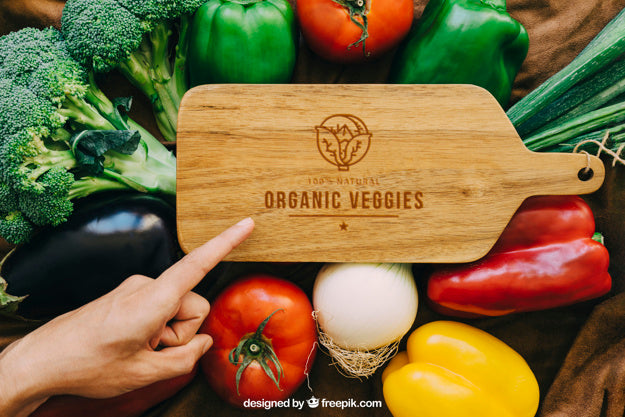 Wood Table Mockup With Vegetable Designs Psd