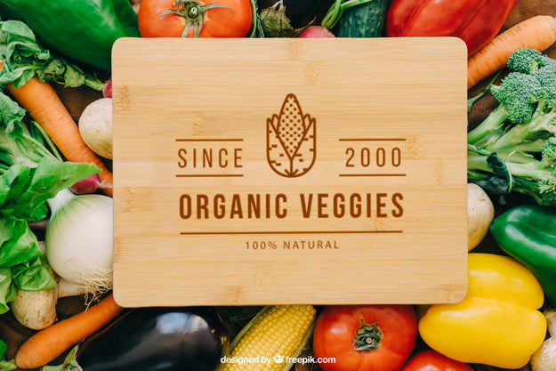 Wood Table Mockup With Vegetable Designs Psd