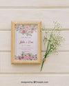 Wooden Frame And Bouquet Of Flowers Psd