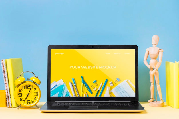 Wooden Mannequin And Laptop With Mock-Up Psd