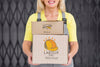 Worker Woman Holding Mock-Up Boxes Psd