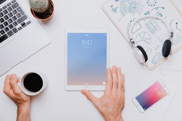 Workspace Concept With Tablet In Middle Psd