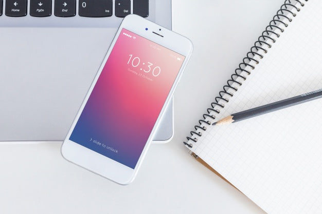 Workspace Mockup With Laptop And Smartphone Psd