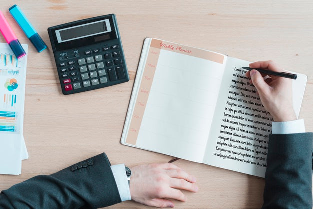 Workspace With Agenda And Calculator Psd