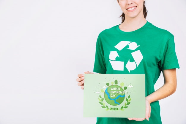 World Environment Day Mockup With Volunteer Holding Paper Psd
