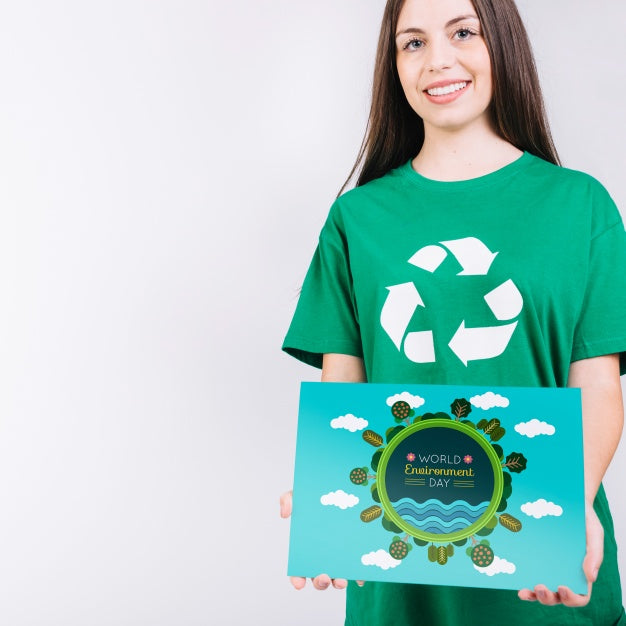 World Environment Day Mockup With Volunteer Holding Paper Psd