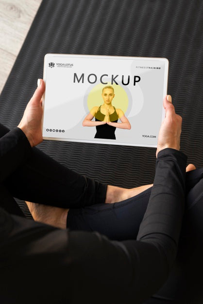 Yoga Instructor Holding A Tablet Mock-Up Psd