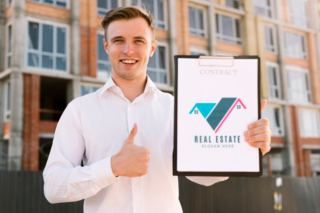 Young Architect Holding A Clipboard Mock-Up Psd