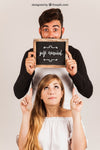 Young Couple Showing Slate Psd