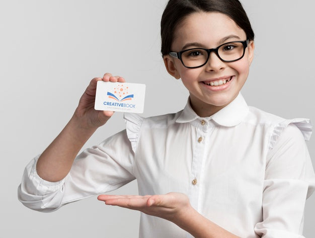 Young Girl Holding Business Card Mock-Up Psd