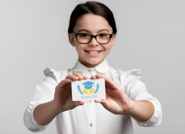 Young Girl Holding Business Card Mock-Up Psd