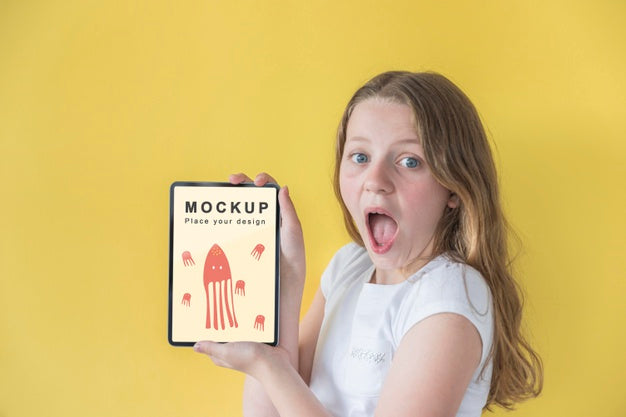 Young Girl Holding Phone With Mock-Up Psd