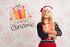 Young Girl With Santa Hat Holding Gift Psd