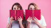 Young Girls Holding Book Cover Mockup Psd