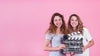 Young Girls Holding Clapperboard Mockup Psd