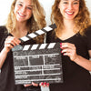 Young Girls Holding Clapperboard Mockup Psd