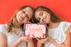 Young Girls Holding Phone With Mock-Up Psd