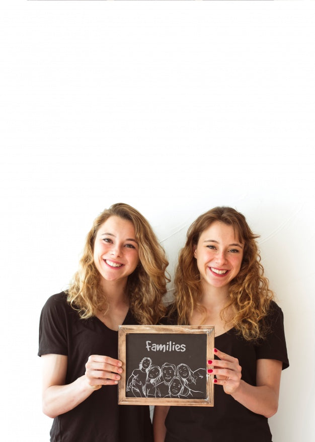 Young Girls Holding Slate Mockup Psd
