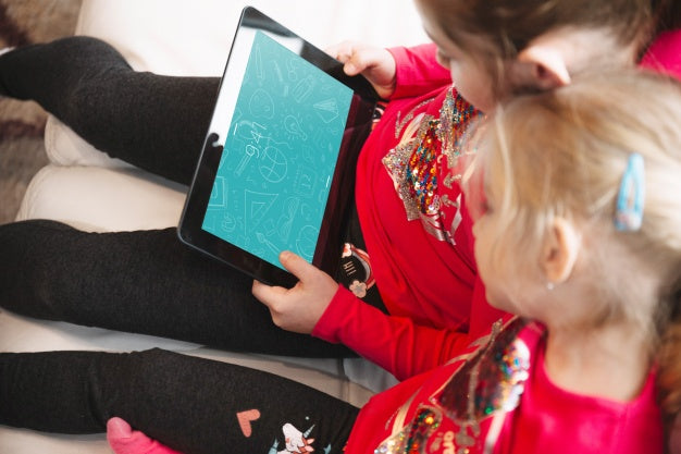 Young Girls Using Tablet Psd