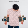 Man with a Skateboard and T-shirt Mockup
