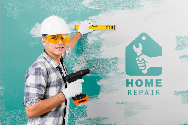 Young Handyman Holding A Drill Psd