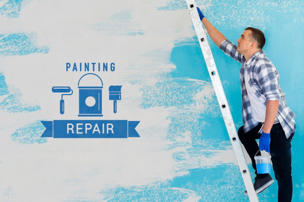 Young Handyman Repairing The Wall Psd