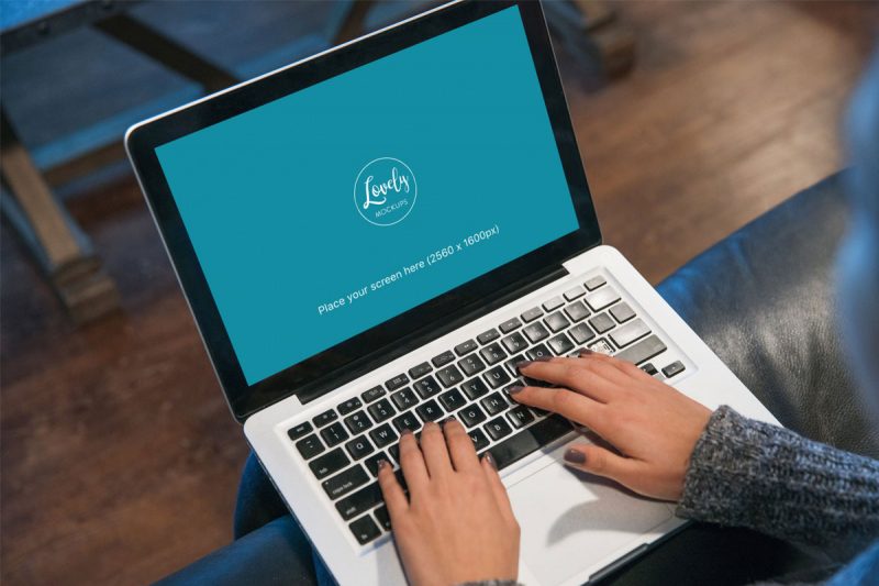 Woman Typing Code on Macbook Pro Mockup